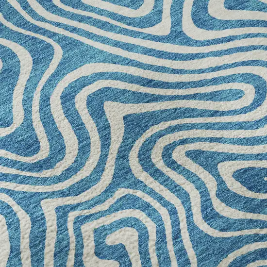 Teal And Ivory Abstract Washable Area Rug With UV Protection Photo 9