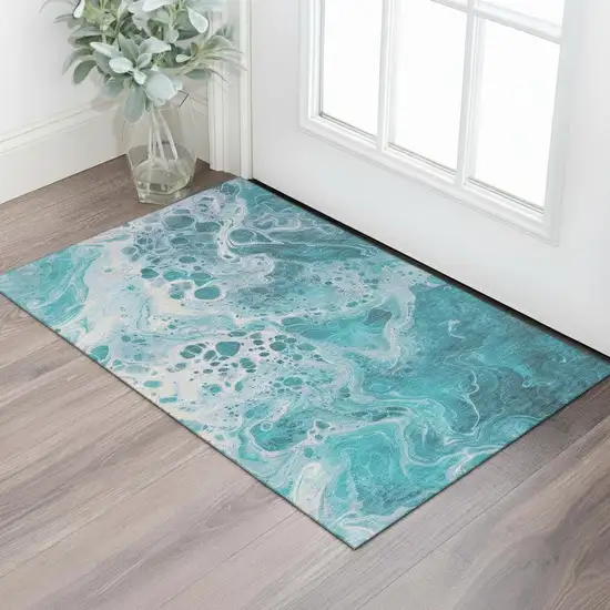 Teal And Ivory Abstract Washable Area Rug With UV Protection Photo 2