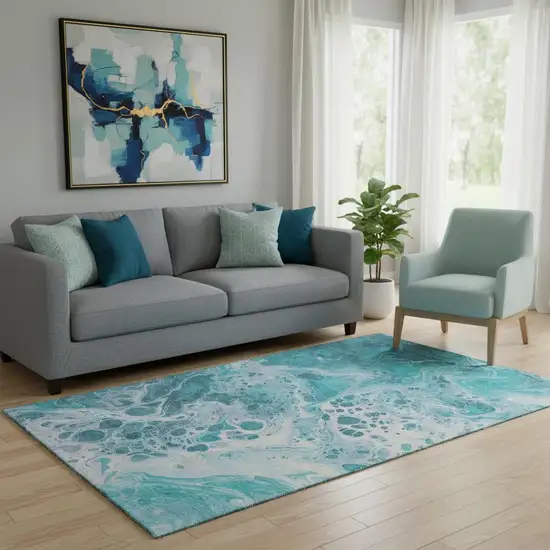 Teal And Ivory Abstract Washable Area Rug With UV Protection Photo 2