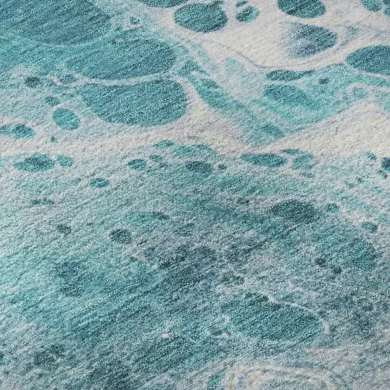 Teal And Ivory Abstract Washable Area Rug With UV Protection Photo 9