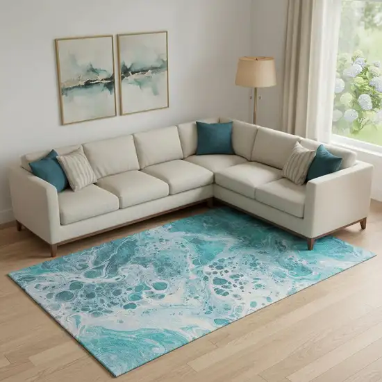 Teal And Ivory Abstract Washable Area Rug With UV Protection Photo 2
