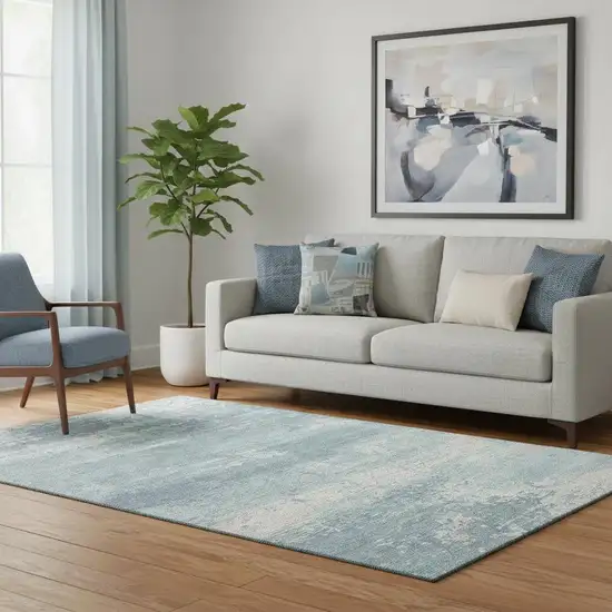 Teal And Ivory Abstract Washable Area Rug With UV Protection Photo 2