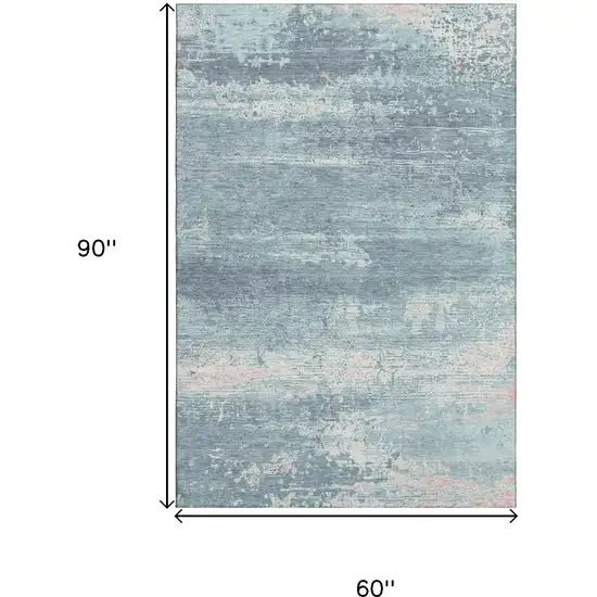 Teal And Ivory Abstract Washable Area Rug With UV Protection Photo 9