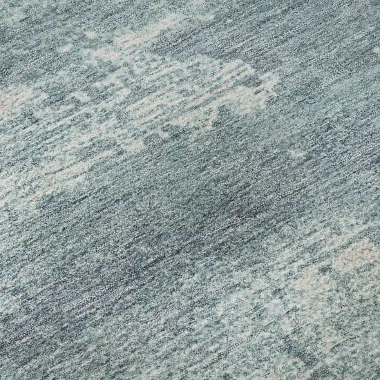 Teal And Ivory Abstract Washable Area Rug With UV Protection Photo 9