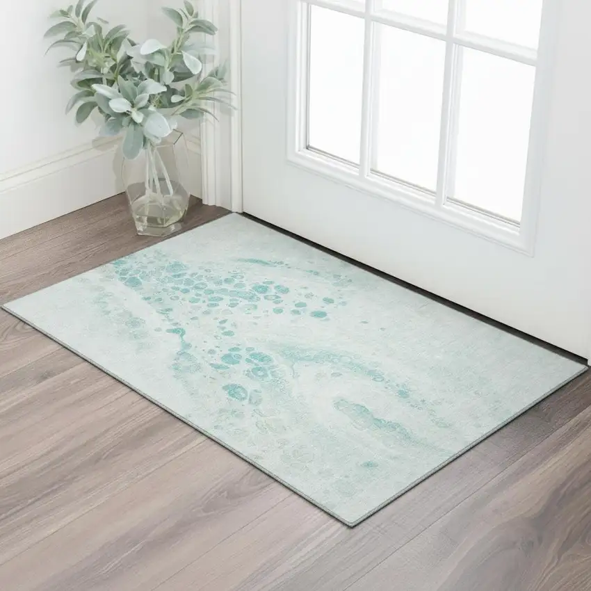 Teal And Ivory Abstract Washable Area Rug With UV Protection Photo 2
