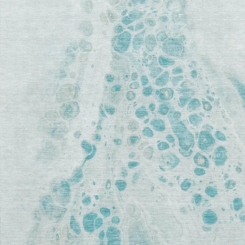 Teal And Ivory Abstract Washable Area Rug With UV Protection Photo 3