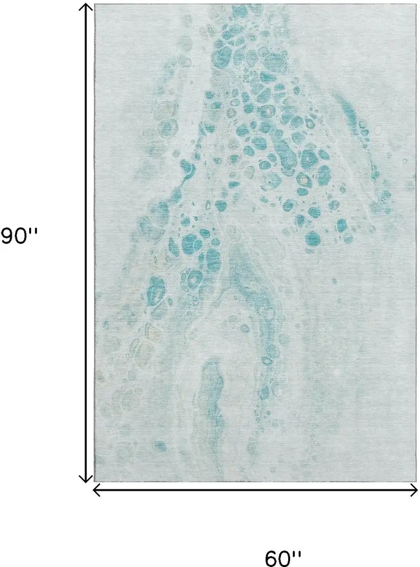 Teal And Ivory Abstract Washable Area Rug With UV Protection Photo 9