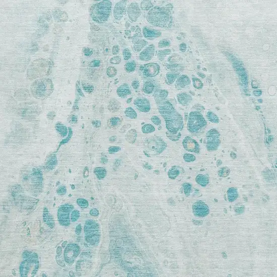 Teal And Ivory Abstract Washable Area Rug With UV Protection Photo 3