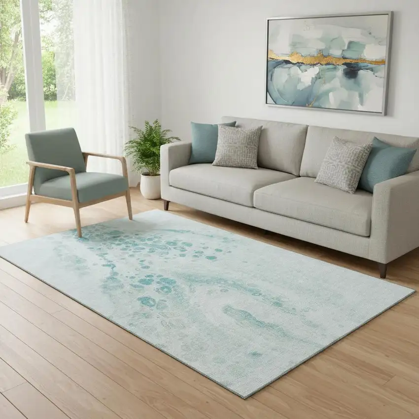 Teal And Ivory Abstract Washable Area Rug With UV Protection Photo 2