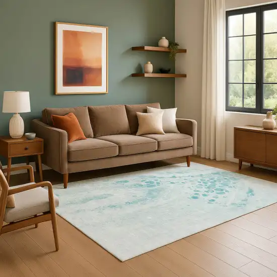 Teal And Ivory Abstract Washable Area Rug With UV Protection Photo 6