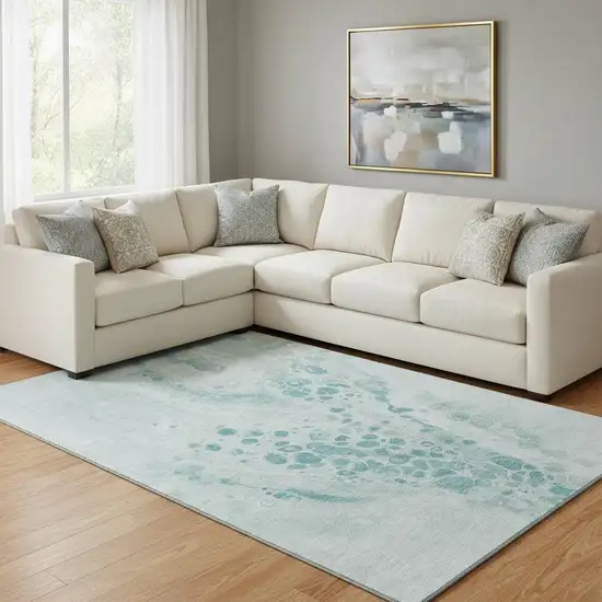 Teal And Ivory Abstract Washable Area Rug With UV Protection Photo 2