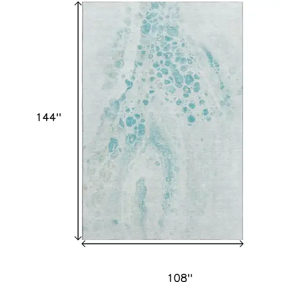 Teal And Ivory Abstract Washable Area Rug With UV Protection Photo 9