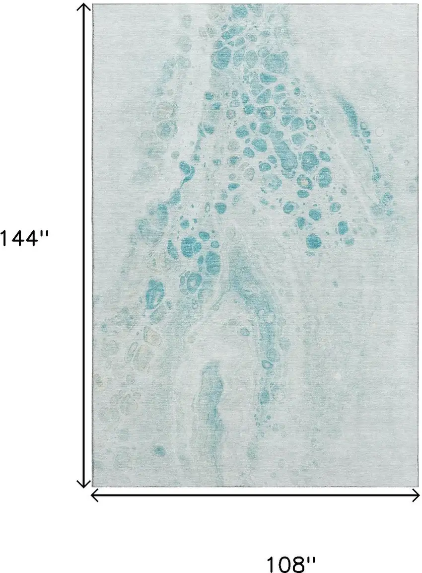 Teal And Ivory Abstract Washable Area Rug With UV Protection Photo 9