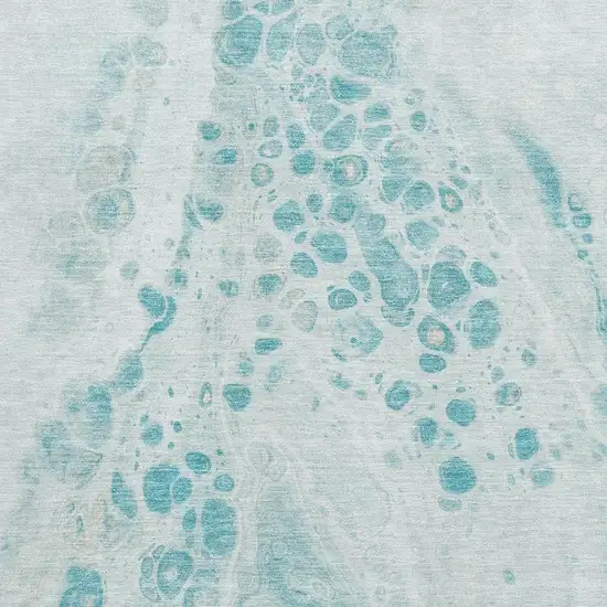 Teal And Ivory Abstract Washable Area Rug With UV Protection Photo 3