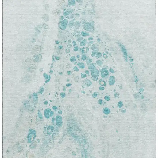 Teal And Ivory Abstract Washable Area Rug With UV Protection Photo 3
