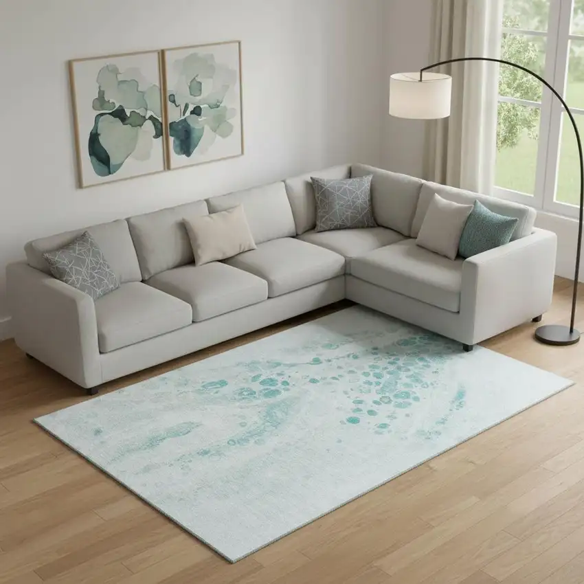 Teal And Ivory Abstract Washable Area Rug With UV Protection Photo 1