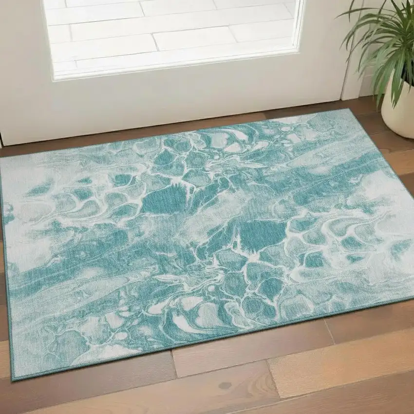 Teal And Ivory Abstract Washable Area Rug With UV Protection Photo 2