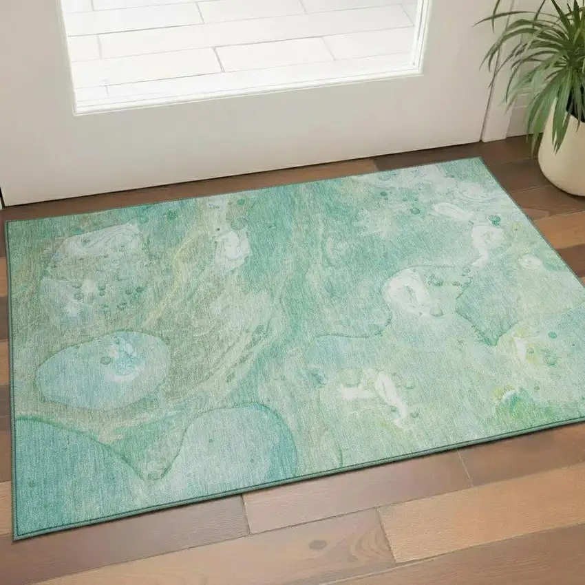 Teal And Ivory Abstract Washable Area Rug With UV Protection Photo 2