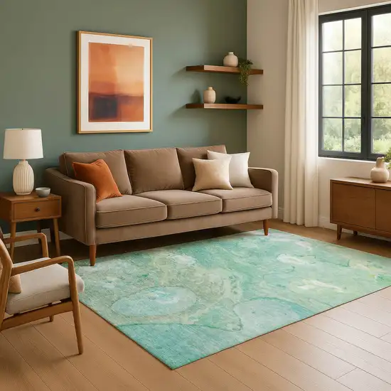 Teal And Ivory Abstract Washable Area Rug With UV Protection Photo 6