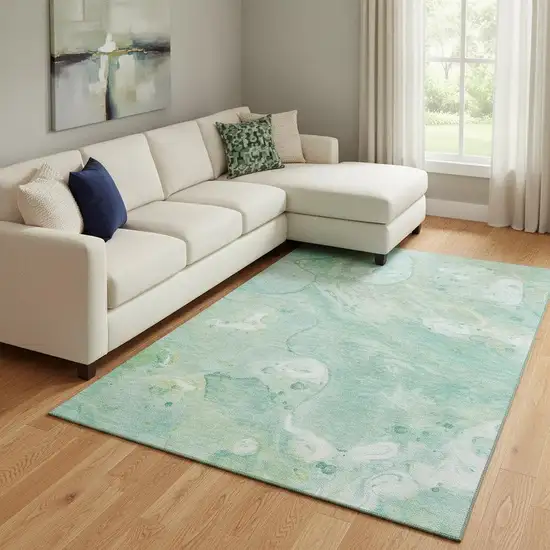 Teal And Ivory Abstract Washable Area Rug With UV Protection Photo 1