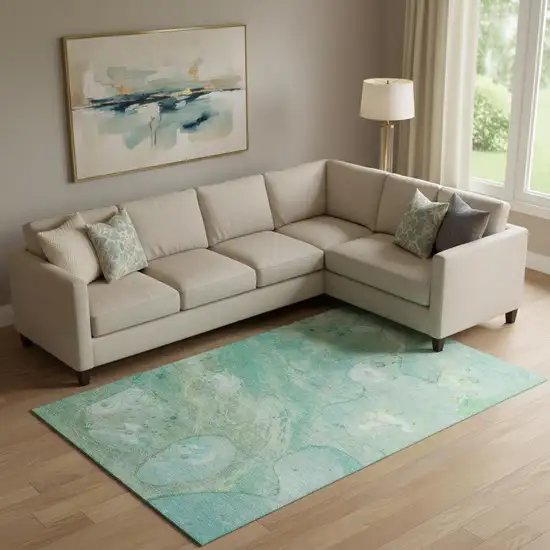 Teal And Ivory Abstract Washable Area Rug With UV Protection Photo 2