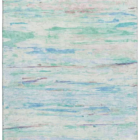 Teal And Ivory Abstract Washable Area Rug With UV Protection Photo 4