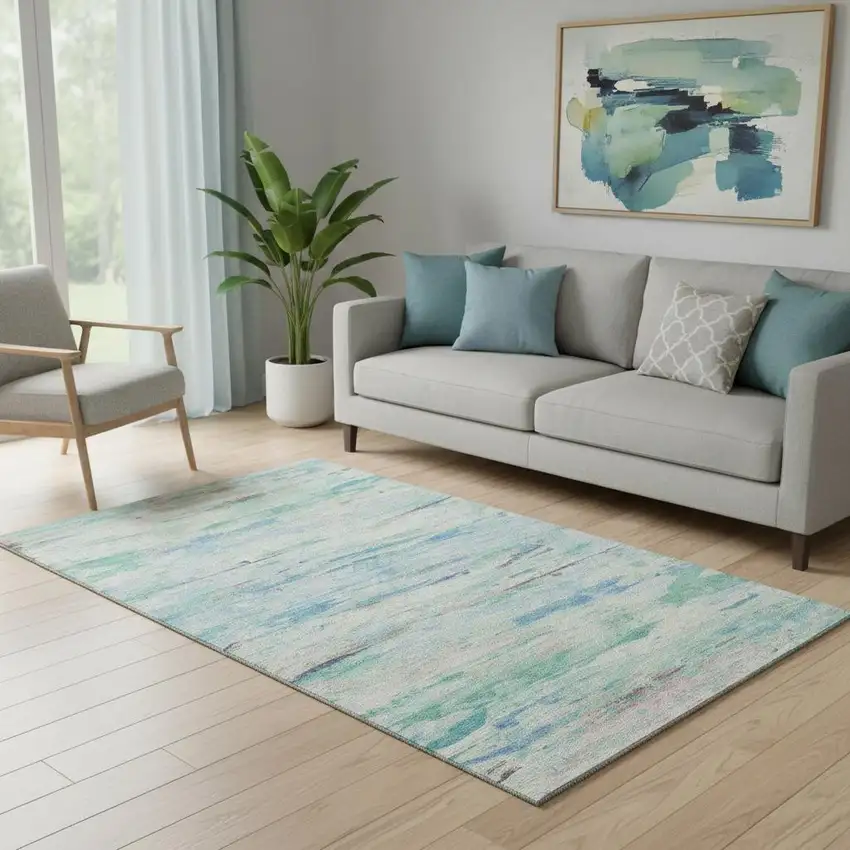 Teal And Ivory Abstract Washable Area Rug With UV Protection Photo 2