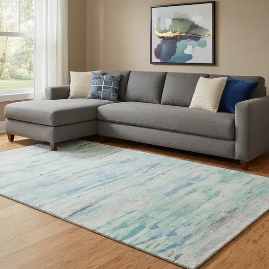 Teal And Ivory Abstract Washable Area Rug With UV Protection Photo 2