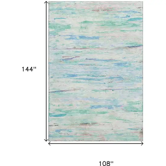 Teal And Ivory Abstract Washable Area Rug With UV Protection Photo 9