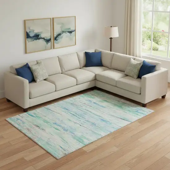 Teal And Ivory Abstract Washable Area Rug With UV Protection Photo 2
