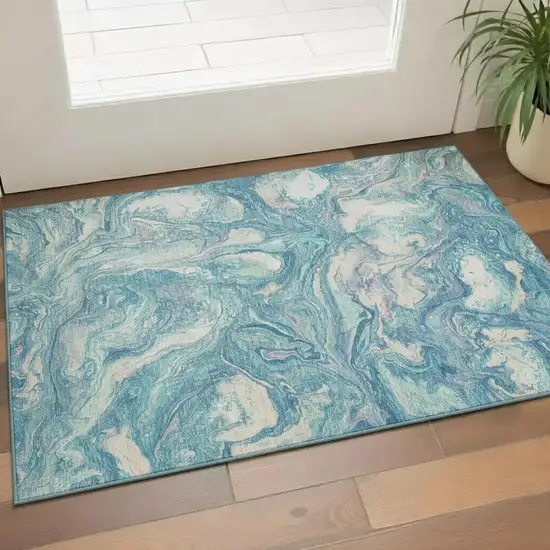 Teal And Ivory Abstract Washable Area Rug With UV Protection Photo 2