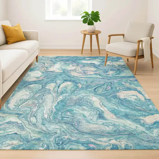 Teal And Ivory Abstract Washable Area Rug With UV Protection Photo 6