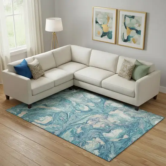 Teal And Ivory Abstract Washable Area Rug With UV Protection Photo 2