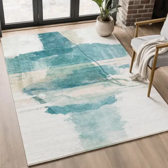Teal And Ivory Abstract Washable Area Rug With UV Protection Photo 5