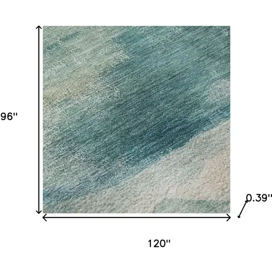Teal And Ivory Abstract Washable Area Rug With UV Protection Photo 9
