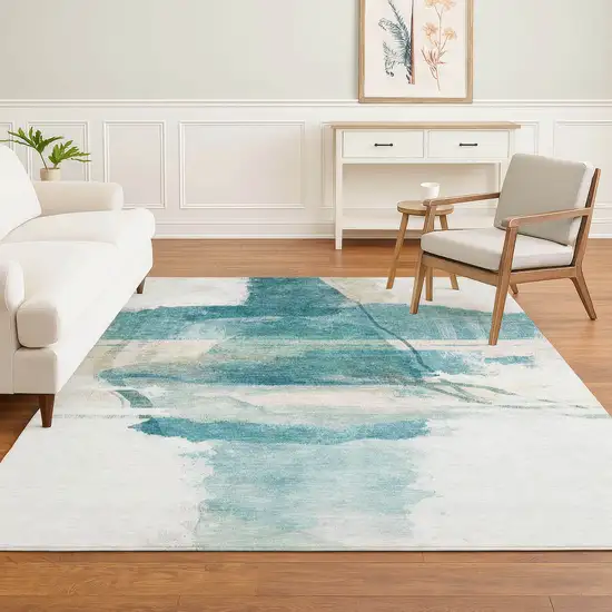 Teal And Ivory Abstract Washable Area Rug With UV Protection Photo 6