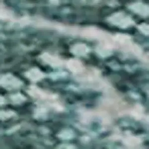 Photo of Teal And Ivory Abstract Washable Area Rug With UV Protection