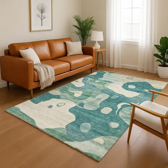 Teal And Ivory Abstract Washable Area Rug With UV Protection Photo 4