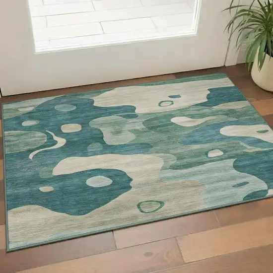 Teal And Ivory Abstract Washable Area Rug With UV Protection Photo 2