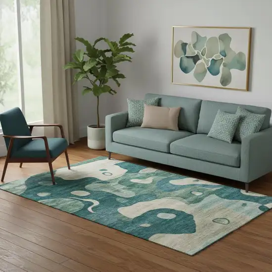 Teal And Ivory Abstract Washable Area Rug With UV Protection Photo 2