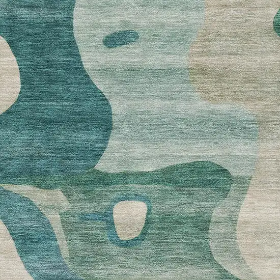 Teal And Ivory Abstract Washable Area Rug With UV Protection Photo 3