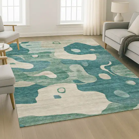 Teal And Ivory Abstract Washable Area Rug With UV Protection Photo 6