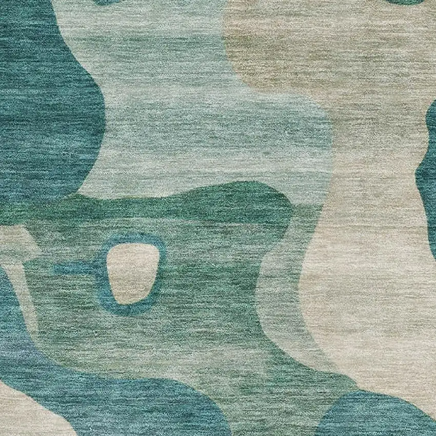 Teal And Ivory Abstract Washable Area Rug With UV Protection Photo 3