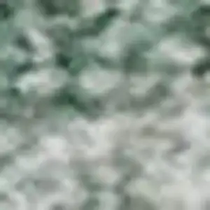 Photo of Teal And Ivory Abstract Washable Area Rug With UV Protection