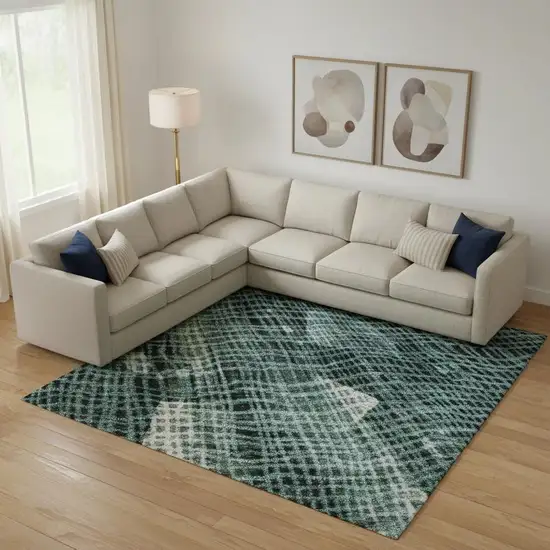 Teal And Ivory Abstract Washable Area Rug With UV Protection Photo 2