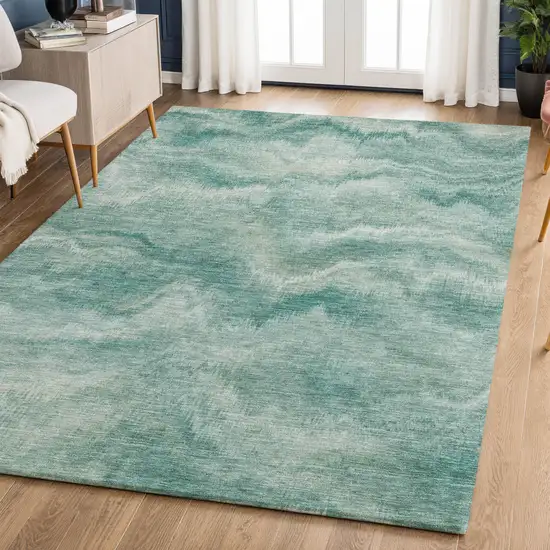 Teal And Ivory Abstract Washable Area Rug With UV Protection Photo 6