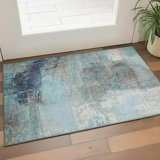 Teal And Ivory Abstract Washable Area Rug With UV Protection Photo 2
