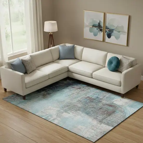 Teal And Ivory Abstract Washable Area Rug With UV Protection Photo 2