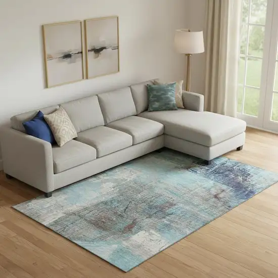 Teal And Ivory Abstract Washable Area Rug With UV Protection Photo 2