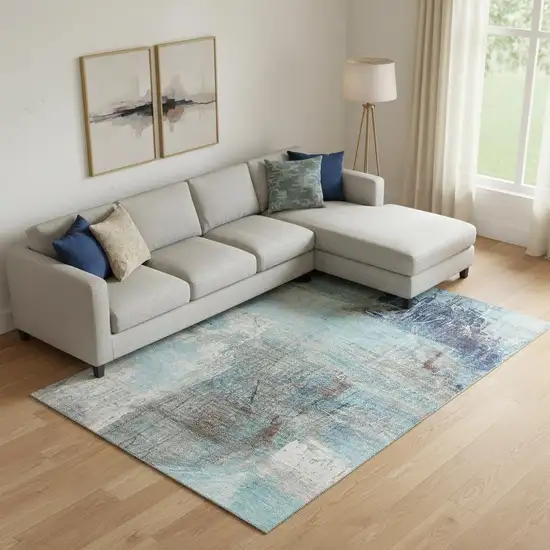Teal And Ivory Abstract Washable Area Rug With UV Protection Photo 2